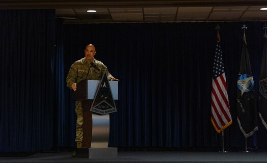  U.S. Space Force Lt. Gen. David N. Miller, Jr., Space Operations Command commander, speaks to audience members during a redesignation ceremony at Peterson Space Force Base, Colo., Oct. 15, 2024. During the ceremony the Position, Navigation and Timing (PNT) Provisional Delta was officially redesignated as Mission Delta 31. the delta continues to provide, operate and sustain high-integrity PNT capabilities to protect our nation’s interests and assure an unparalleled global utility of the Global Positioning Satellite constellation, but with additional units dedicated to future capability development. (U.S. Space Force photo by John Ayre)
