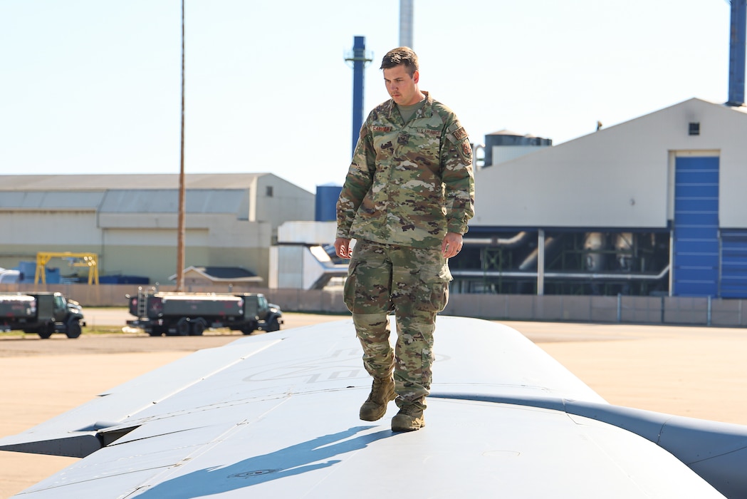 U.S. Air Force Staff Sgt. Brett Carroll, an aircraft maintainer with the 191st Maintenance Squadron, Michigan Air National Guard, conducts a post-flight inspection on a KC-135 Stratotanker aircraft in Gwinn, Michigan, Sept. 30, 2024. Nearly 100 Airmen from the 127th Air Refueling and 127th Mission Support Groups, temporarily dispersed to Marquette Sawyer Regional Airport in Gwinn and Detroit Metropolitan Wayne County Airport in Romulus while the runway was repaired at Selfridge Air National Guard Base. (U.S. Air National Guard photo by Tech. Sgt. Andrew Schumann)