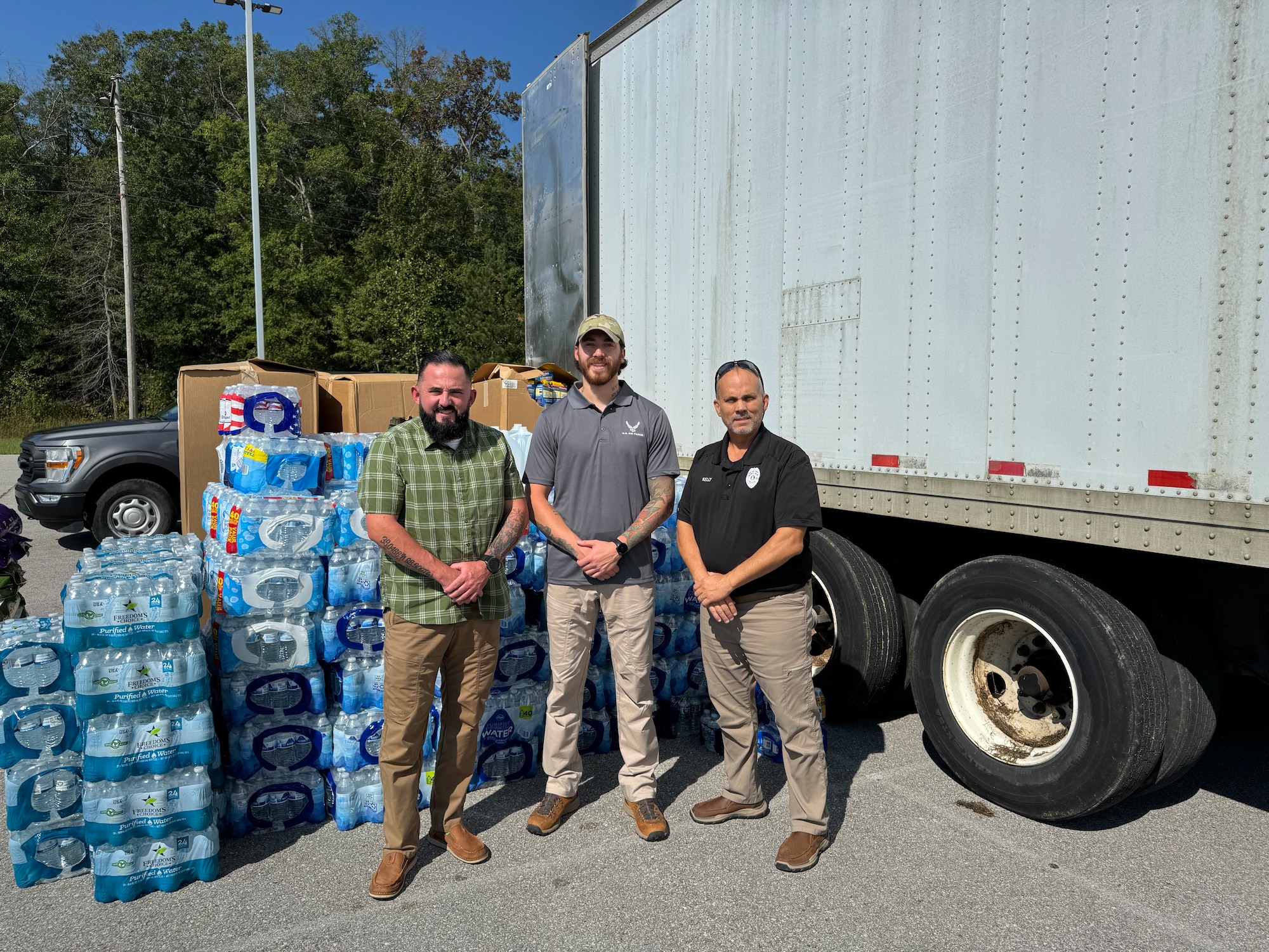 Arnold Air Force Base Police personnel gather supplies to be provided to people recently impacted by Hurricane Helene Oct. 3, 2024, at Arnold AFB, Tenn. In conjunction with the Coffee County and Franklin County sheriff’s offices, Arnold AFB Police assisted in the rescue missions executed by law enforcement in east Tennessee by donating supplies purchased by Arnold AFB Police officers and staff from personal funds. Pictured from left are Arnold AFB Security Forces Assistant Chief Jason Layne, Arnold AFB Security Forces Training Manager Anthony Rosas and Arnold AFB Security Forces Chief Ray Kelly. (Courtesy photo)