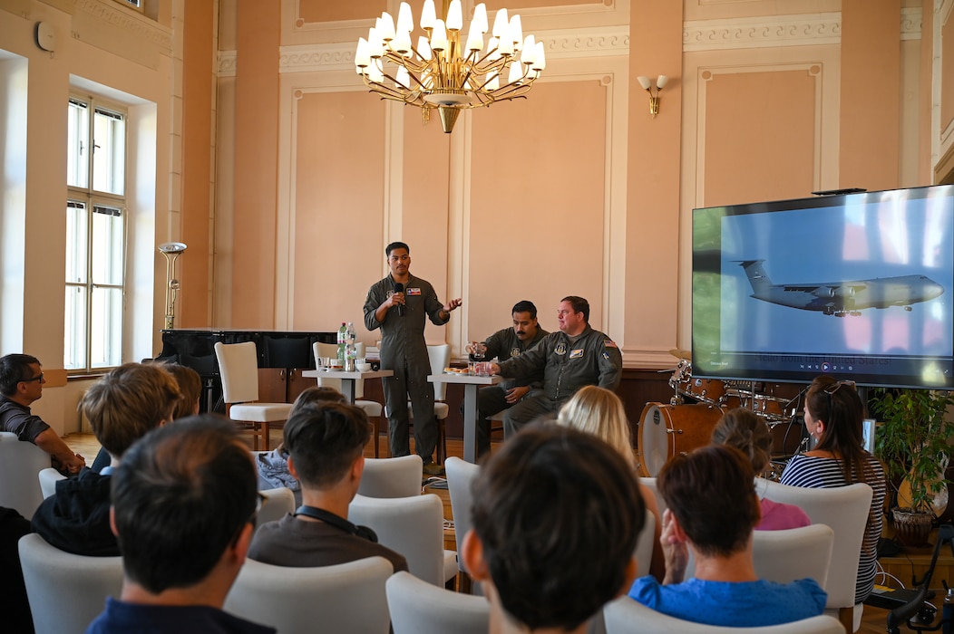 Staff Sgt. Jaylen Myles, 68th Airlift Squadron C-5 flight engineer instructor, introduces himself to students from Masarykovo gymnázium Příbor, a high School in the Czech Republic, during a seminar about serving in the United States Air Force, Sept. 24, 2024.