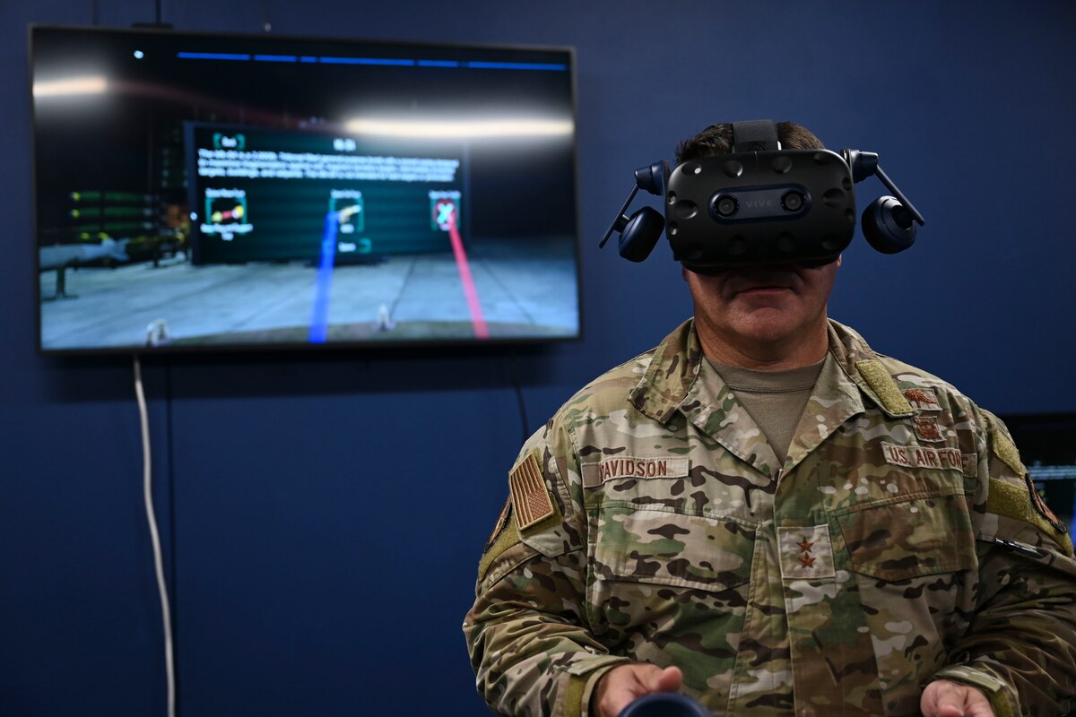 U.S. Air Force Maj. Gen. Wolfe Davidson, Second Air Force Commander, uses virtual reality training equipment at the 17th Training Support Squadron’s Instructional Technology Unit, Goodfellow Air Force Base, Texas, Oct. 1, 2024. These programs aim to keep Airmen informed and mission-ready as they transition to their operational units. (U.S. Air Force photo by Airman 1st Class Madi Collier)