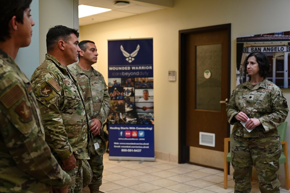 U.S. Air Force Maj. Gen. Wolfe Davidson, Second Air Force Commander, is briefed by Lt. Col. Shelly Metcalf, 17th Operational Medical Readiness Squadron Commander, at the Ross Clinic, Goodfellow Air Force Base, Texas, Oct. 1, 2024. The 17 MDG walked them through newly implemented programs and plans to continue to elevate the level of care provided to permanent party and students. (U.S. Air Force photo by Airman 1st Class Madi Collier)