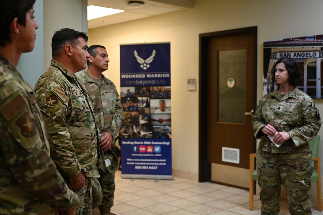 U.S. Air Force Maj. Gen. Wolfe Davidson, Second Air Force Commander, is briefed by Lt. Col. Shelly Metcalf, 17th Operational Medical Readiness Squadron Commander, at the Ross Clinic, Goodfellow Air Force Base, Texas, Oct. 1, 2024. The 17 MDG walked them through newly implemented programs and plans to continue to elevate the level of care provided to permanent party and students. (U.S. Air Force photo by Airman 1st Class Madi Collier)