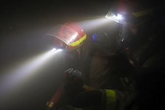 Sailors fight a simulated fire during a general quarters drill aboard USS Arleigh Burke (DDG 51) in the Mediterranean Sea.