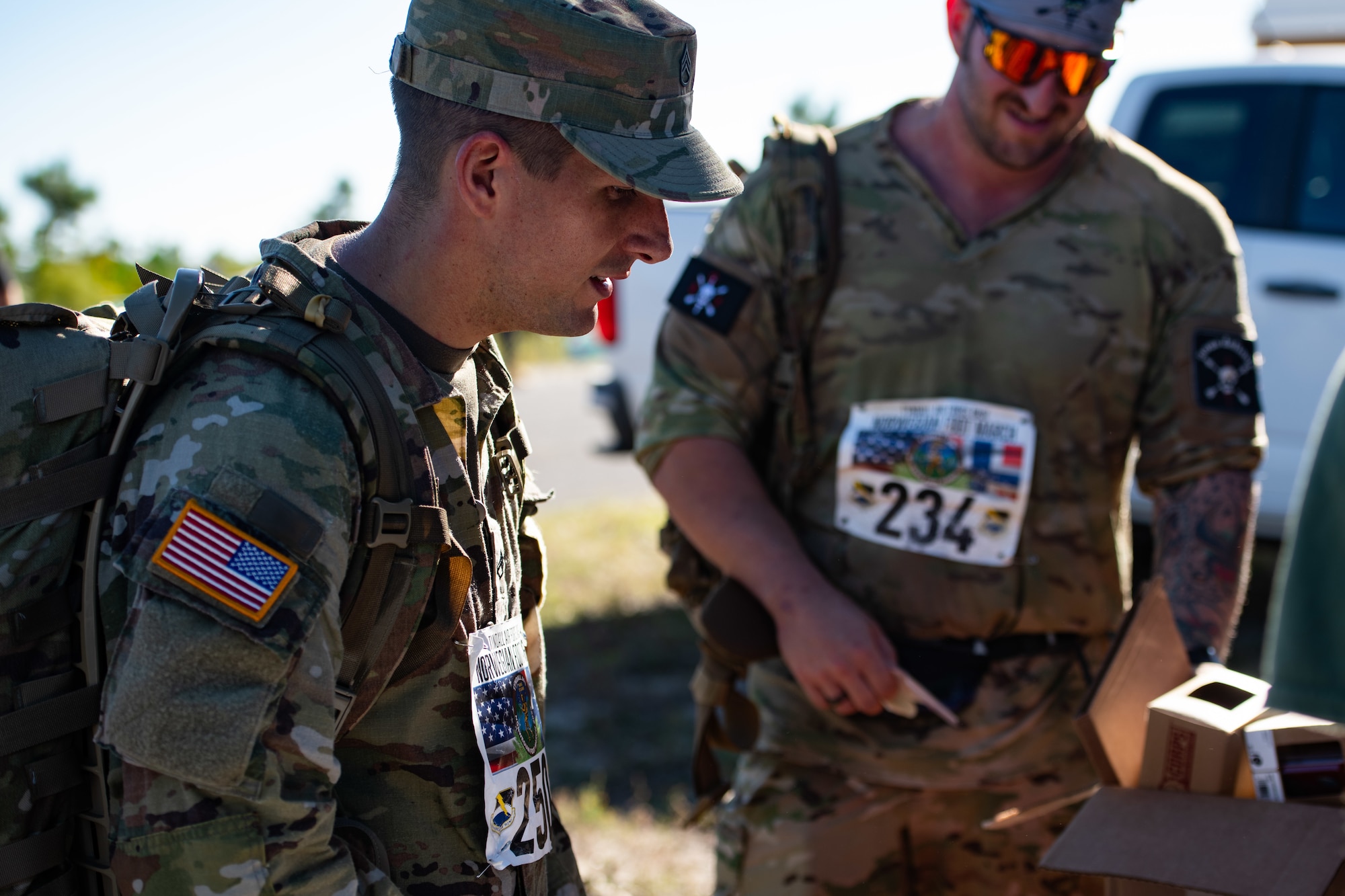 U.S. Army Soldiers record their ruck march times.