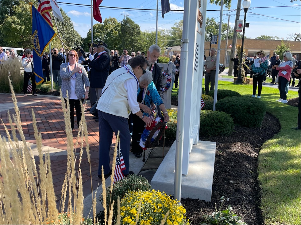 Rosemarie Dillon, the 89-year-old niece and primary next of kin of Illinois Army National Guard Pfc. Harry Jerele, lays a wreath at the Veterans Park in Berkeley, Illinois.