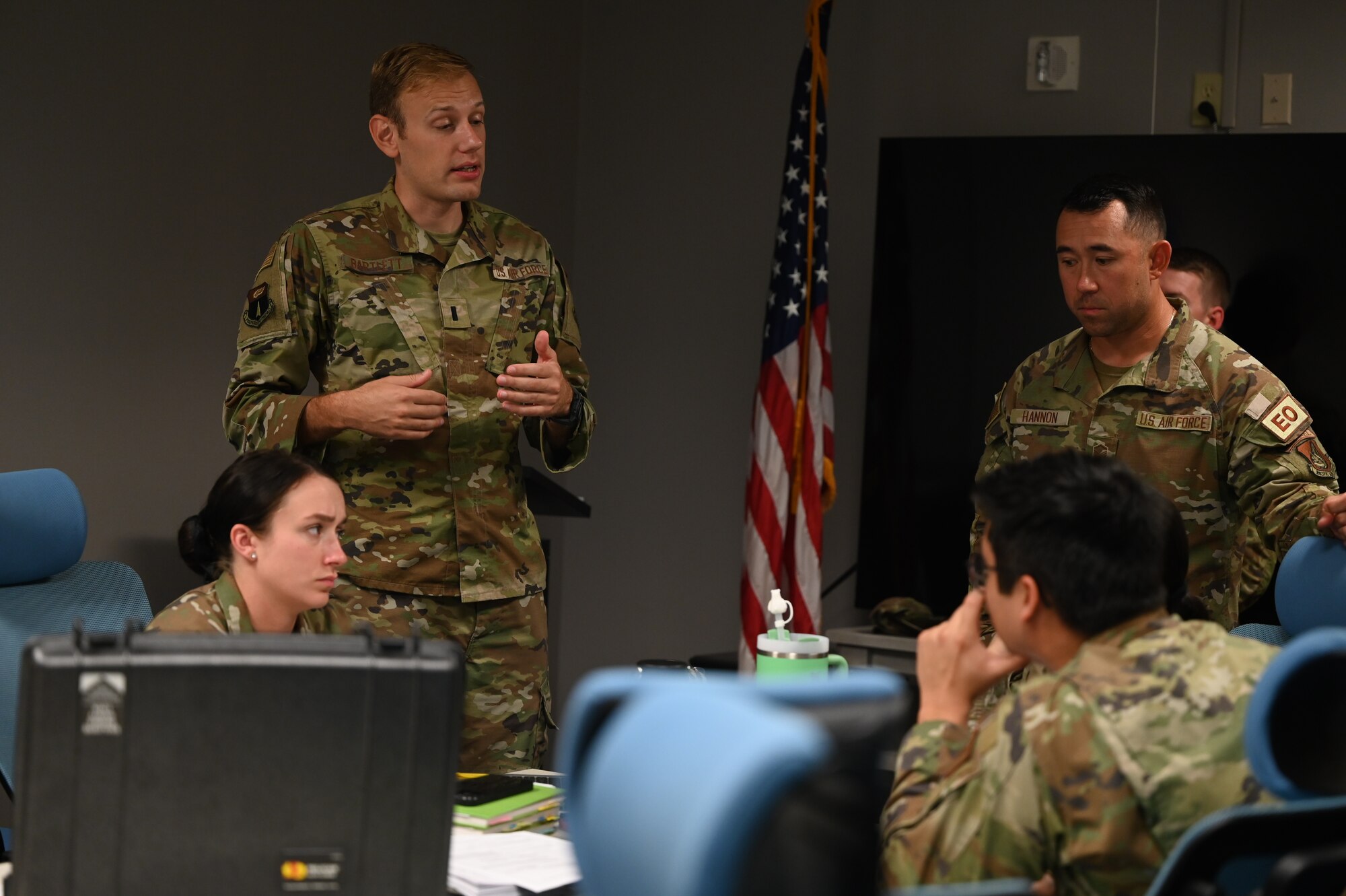 1st Lt. Benjamin Bartlett, 36th Comptroller Squadron functional mission analysis officer, discusses operational information as part of Slingstone 24-4 at Andersen Air Force Base, Guam, October 15, 2024. The Slingstone 24-4 training exercises demonstrates the airmen’s capabilities in providing a safe, secure, and efficient operational atmosphere. (U.S. Air Force photo by Airman 1st Class Adasha Williams)