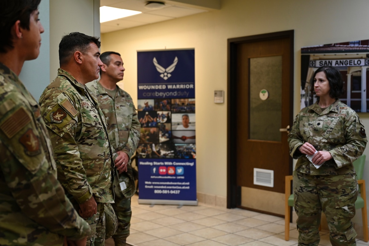 U.S. Air Force Maj. Gen. Wolfe Davidson, Second Air Force Commander, is briefed by Lt. Col. Shelly Metcalf, 17th Operational Medical Readiness Squadron Commander, at the Ross Clinic, Goodfellow Air Force Base, Texas, Oct. 1, 2024. The 17 MDG walked them through newly implemented programs and plans to continue to elevate the level of care provided to permanent party and students. (U.S. Air Force photo by Airman 1st Class Madi Collier)