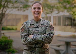 A woman poses for a photo.