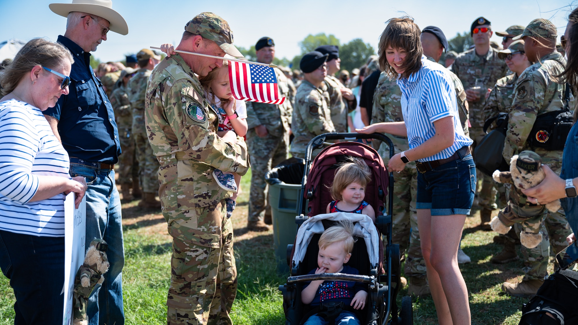 Dyess Airmen and families welcome home deployed personnel at Dyess Air Force Base, Texas, Oct. 10, 2024. The 7th Bomb Wing held a welcome home celebration attended by friends and family of returning personnel. (U.S. Air Force photo by Airman 1st Class Jade M. Caldwell)