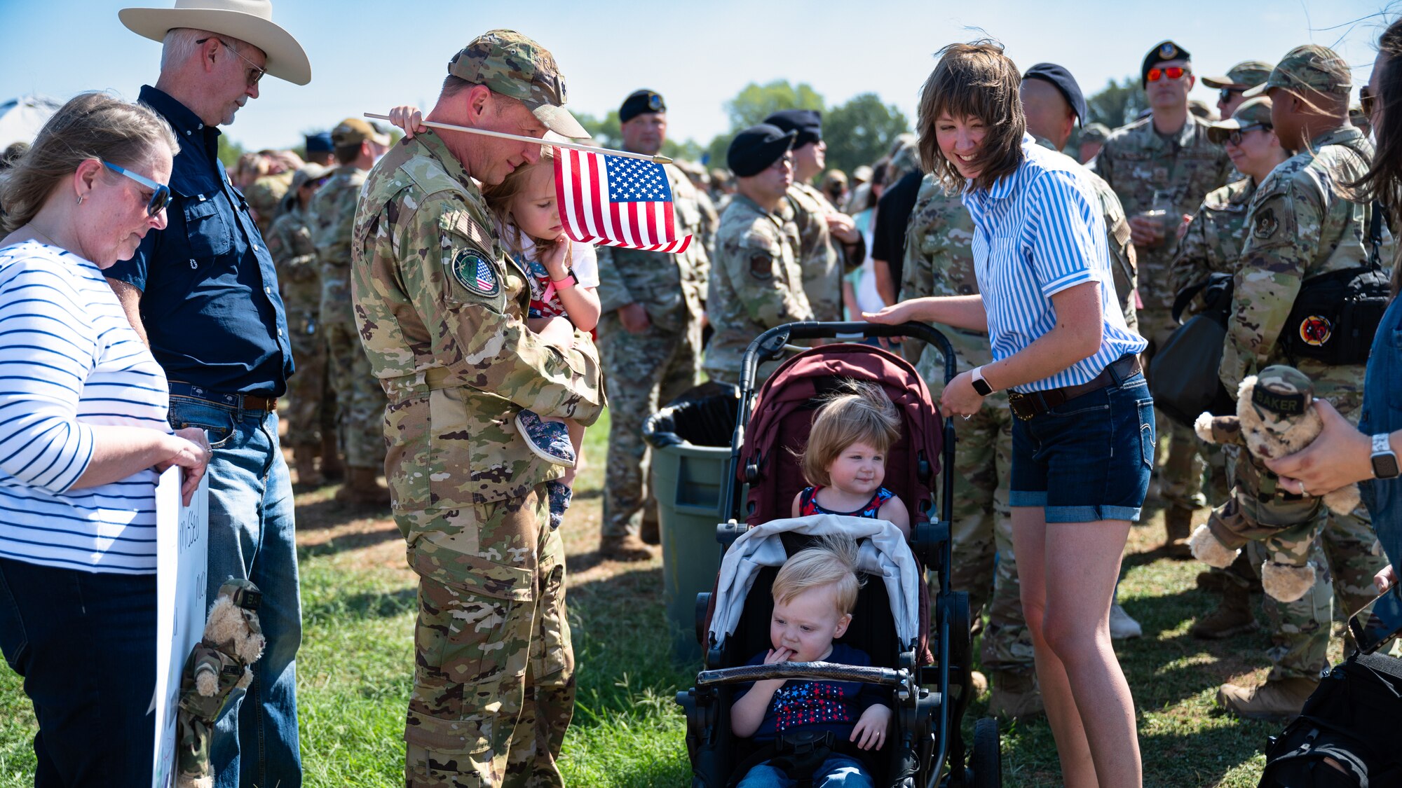 Dyess Airmen and families welcome home deployed personnel at Dyess Air Force Base, Texas, Oct. 10, 2024. The 7th Bomb Wing held a welcome home celebration attended by friends and family of returning personnel. (U.S. Air Force photo by Airman 1st Class Jade M. Caldwell)