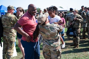 Dyess Airmen return from deployment at Dyess Air Force Base, Texas, Oct. 10, 2024. Returning personnel were greeted by their friends and families in a welcome home celebration. (U.S. Air Force photo by Airman 1st Class Jade M. Caldwell)