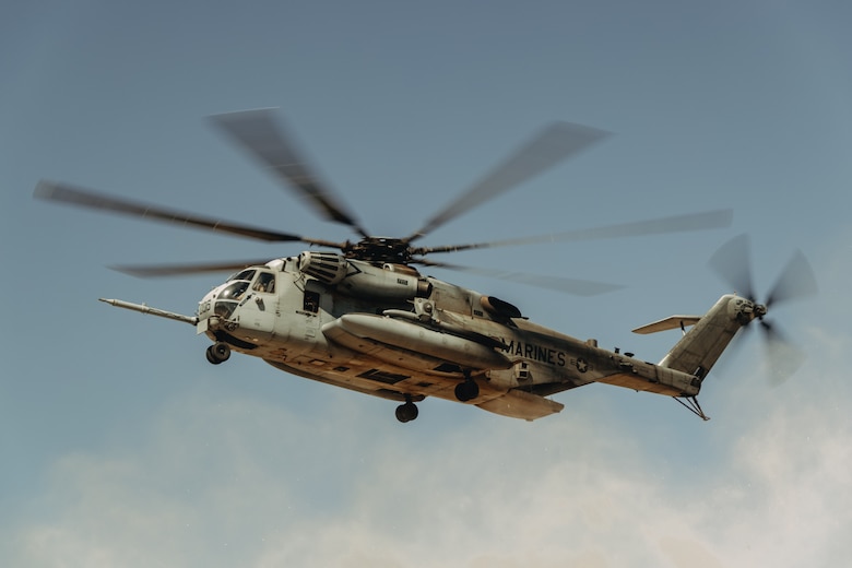 A U.S. Marine Corps CH-53E Super Stallion assigned to Marine Aviation Weapons and Tactics Squadron One, flies during a ground-based air defense exercise as part of Weapons and Tactics Instructor course 1-25 at Tacts Airfield near Wellton, Arizona, Oct. 10, 2024. WTI is a seven-week training event hosted by MAWTS-1 which emphasizes operational integration of the six functions of Marine aviation in support of the Marine Air Ground Task Force, Joint and Coalition Forces. (U.S. Marine Corps photo by Lance Cpl. Micah Thompson)