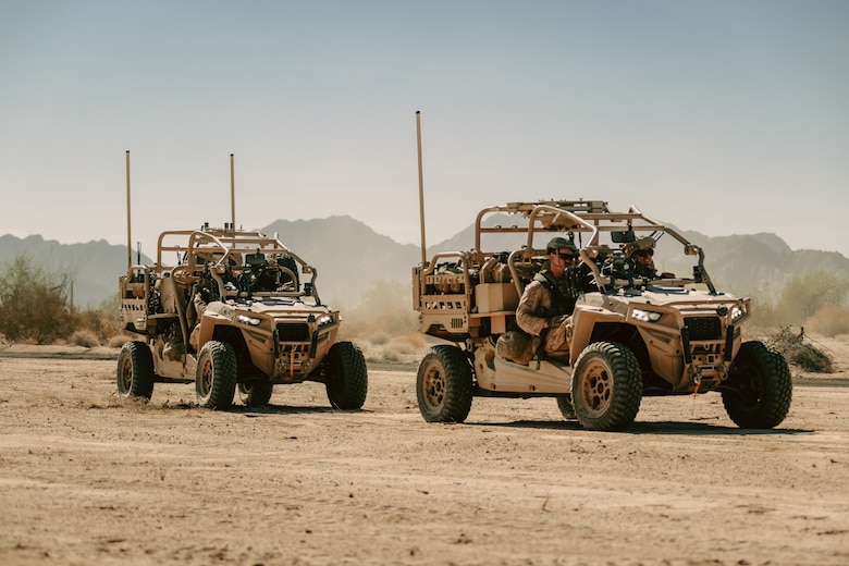 U.S. Marines assigned to 3rd Low Altitude Air Defense Battalion, 3rd Marine Aircraft Wing, watch for nearby unmanned aerial systems using a Light Marine Air Defense Integrated System during a ground-based air defense exercise as part of Weapons and Tactics Instructor course 1-25 at Tacts Airfield near Wellton, Arizona, Oct. 10, 2024. WTI is a seven-week training event hosted by Marine Aviation Weapons and Tactics Squadron One which emphasizes operational integration of the six functions of Marine aviation in support of the Marine Air Ground Task Force, Joint and Coalition Forces. (U.S. Marine Corps photo by Lance Cpl. Micah Thompson)