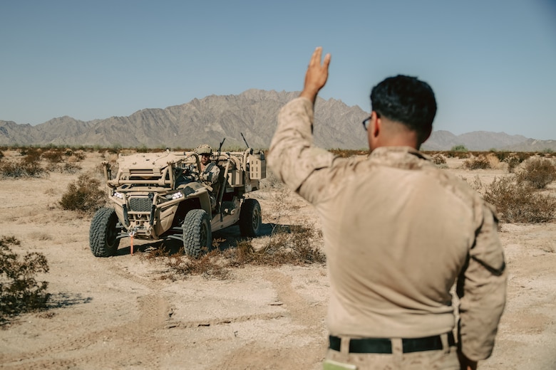 U.S. Marine Corps Sgt. Angel LopezLopez a Phoenix, Arizona native and a low altitude air defense gunner assigned to 3rd Low Altitude Air Defense Battalion, 3rd Marine Aircraft Wing, guides a Light Marine Air Defense Integrated System during a ground-based air defense exercise as part of Weapons and Tactics Instructor course 1-25 at Tacts Airfield near Wellton, Arizona, Oct. 10, 2024. WTI is a seven-week training event hosted by Marine Aviation Weapons and Tactics Squadron One which emphasizes operational integration of the six functions of Marine aviation in support of the Marine Air Ground Task Force, Joint and Coalition Forces. (U.S. Marine Corps photo by Lance Cpl. Micah Thompson)