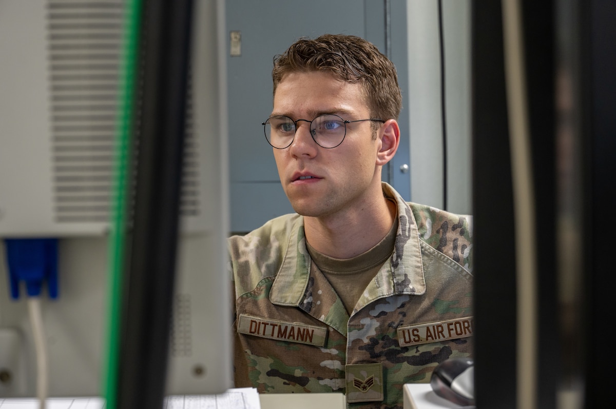 U.S. Air Force Senior Airman James Dittmann, 39th Operations Support Squadron Radar, Airfield and Weather Systems supervisor, reviews technical orders for the digital airport surveillance radar (DASR), Oct. 10, 2024, at Incirlik Air Base, Türkiye