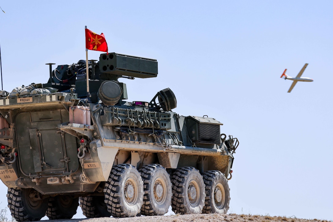 An Army Stryker aims its cannon at an Outlaw drone during crew qualification gunnery training at Fort Cavazos, Texas, Oct. 14, 2024.