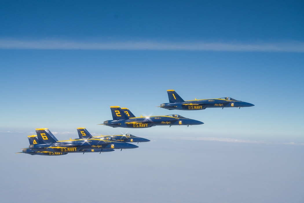 Six U.S. Navy Blue Angels F/A-18 Super Hornet aircraft fly in the skies of Texoma, Oct. 14, 2024. The formation met with two KC-46 Pegasus aircraft, assigned to the 56th Air Refueling Squadron, to receive fuel mid-flight. (U.S. Air Force photo by Airman 1st Class Lauren Torres)