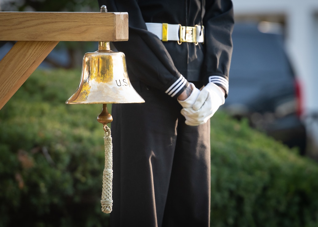 WASHINGTON (October 10, 2024) - A member of the U.S. Navy Ceremonial Guard stands ready to ring a bell during a celebration of the U.S. Navy's 249th Birthday. The central theme of this year's birthday is "Warfighting Strength and Readiness" which highlights our Navy's focus, that everything we do and have done is through a warfighting lens, to deliver decisive combat power. (U.S. Navy photo by Mass Communication Specialist 1st Class Griffin Kersting)