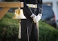 WASHINGTON (October 10, 2024) - A member of the U.S. Navy Ceremonial Guard stands ready to ring a bell during a celebration of the U.S. Navy's 249th Birthday. The central theme of this year's birthday is "Warfighting Strength and Readiness" which highlights our Navy's focus, that everything we do and have done is through a warfighting lens, to deliver decisive combat power. (U.S. Navy photo by Mass Communication Specialist 1st Class Griffin Kersting)