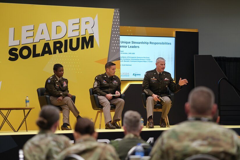 Lt. Gen. Charles Costanza, V Corps commanding general, shares his insights on battalion and corps level leadership responsibilities with 55 battalion command teams from across the total army at the 2024 Association of the United States Army's Leader Solarium. Costanza described how critical it is for commanders and command sergeants major to foster trust and be advocates for their formations. (U.S. Army photo by Maj. Daniel Parker)