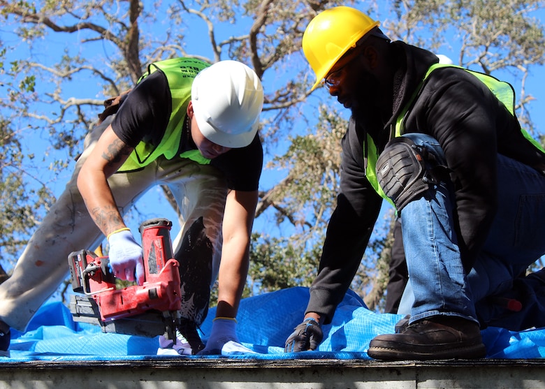 The U.S. Army Corps of Engineers (USACE) Operation Blue Roof Program contractors install first blue roof at a record-setting pace, one-week post-storm and one day after the issuance of the notice to proceed, in the wake of the aftermath of Hurricane Milton. (USACE photo by Peggy Bebb)