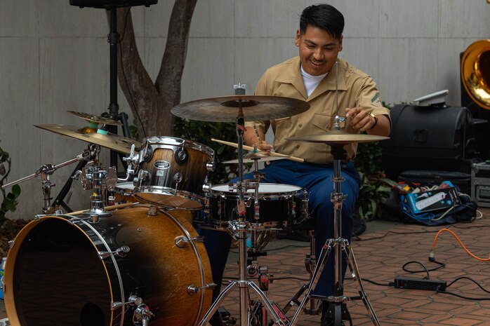 U.S. Marine Corps Lance Cpl. Arturo Tellez Jr., an instrumentalist with 1st Marine Division Band, performs at West Portal Courtyard as part of San Francisco Fleet Week 2024 in San Francisco, Oct. 12, 2024. SFFW, now in its 43rd iteration, is a time-honored sea service celebration that allows citizens of the Bay Area to witness today’s maritime capabilities firsthand. Nearly 2,500 Sailors, Marines, and Coast Guardsmen will showcase their capabilities and equipment, participate in various community service events, and enjoy the hospitality of the Bay Area during the event. (U.S. Marine Corps photo by Cpl. Bruin Largent)