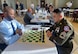 U.S. Army Soldier SFC Arellano sits at chess board during U.S. Armed Forces Chess Competition