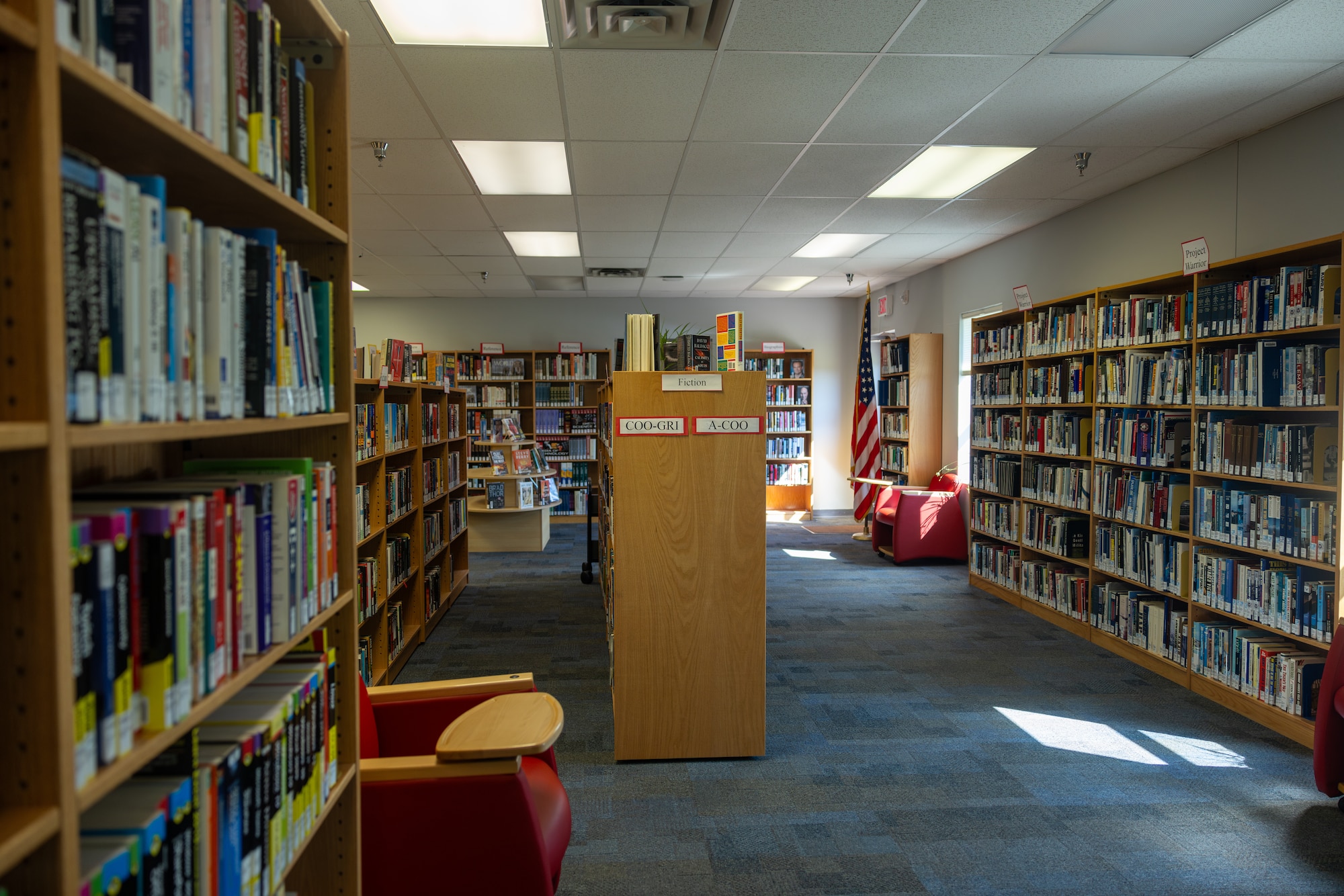 Picture of the Tinker Library, showcasing the large selection of books on the shelves.