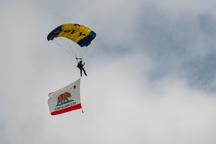 A member of the U.S. Navy Leap Frogs Parachute Team descends on the Marina Green during San Francisco Fleet Week 2024 in San Francisco, Oct. 13, 2024. SFFW, now in its 43rd iteration, is a time-honored sea service celebration that allows citizens of the Bay Area to witness today’s maritime capabilities firsthand. Nearly 2,500 Sailors, Marines, and Coast Guardsmen will showcase their capabilities and equipment, participate in various community service events, and enjoy the hospitality of the Bay Area during the event. (U.S. Marine Corps photo by Cpl. Bruin Largent)