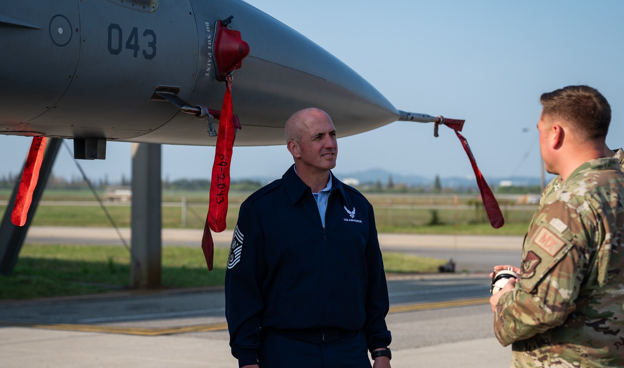 Chief Master Sgt. of the Air Force David Flosi receives a Super Squadron brief from members assigned to the 36th Fighter Generation Squadron at Osan Air Base, Republic of Korea, Oct. 17, 2024. The Super Squadron initiative focuses on integrating and optimizing resources to improve mission effectiveness and readiness. This provides an opportunity for the peninsula to improve resource efficiency and enhance operational capabilities at the 51st Fighter Wing. (U.S. Air Force photo by Senior Airman Brittany Russell)