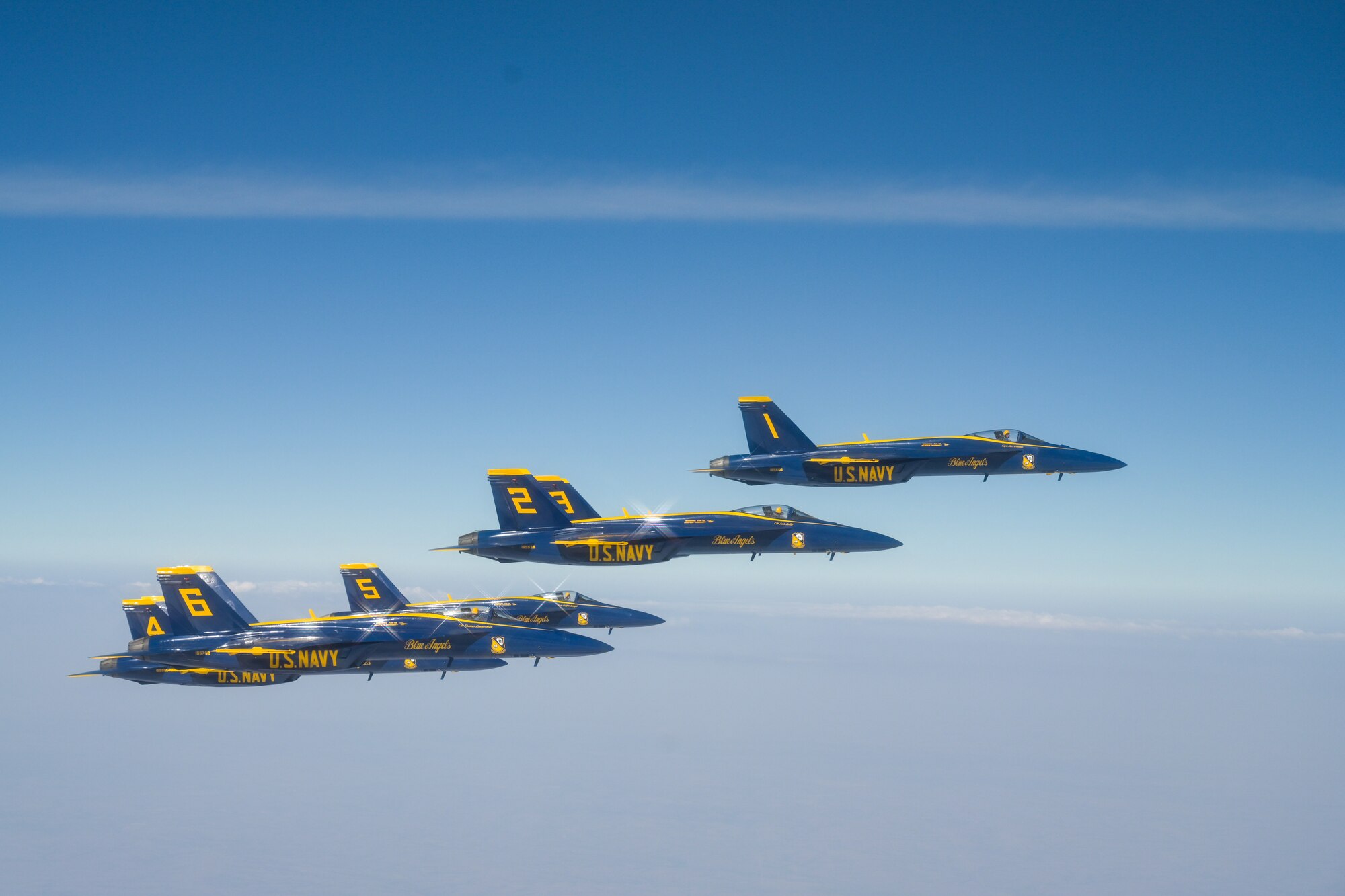 Six U.S. Navy Blue Angels F/A-18 Super Hornet aircraft fly in the skies of Texoma, Oct. 14, 2024. The formation met with two KC-46 Pegasus aircraft, assigned to the 56th Air Refueling Squadron, to receive fuel mid-flight. (U.S. Air Force photo by Airman 1st Class Lauren Torres)