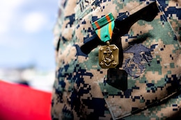 U.S. Marines and Sailors are awarded with Navy and Marine Corps Achievement Medals and Letters of Appreciation at Camp Schwab, Okinawa, Japan, Oct. 11, 2024. The Marines and Sailors were awarded for their heroic actions in providing aid to a Japanese local after a vehicle accident in Okinawa, Japan. The Marines are with 4th Marine Regiment, 3d Marine Division. (U.S. Marine Corps photo by Cpl. Michael Taggart)