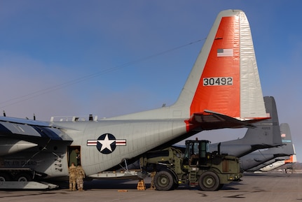 Airmen from the 109th Airlift Wing prepare to depart for Operation Deep Freeze with LC-130 Hercules aircraft from Scotia, N.Y., Oct.17, 2024. Operation Deep Freeze is an annual U.S. Pacific Air Forces-led joint interagency mission to provide logistical and transportation support to the National Science Foundation and the U.S. Antarctic program.