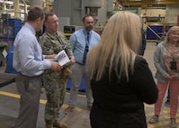 APFIT Program Manager, Mr. Devin Bohanan, receives a tour of TRFB from U.S. Navy Capt. Michael Eberlein, commanding officer, TRFB.