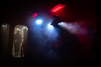 Sailors fight a simulated fire during a general quarters drill aboard USS Nimitz (CVN 68) in the Pacific Ocean.