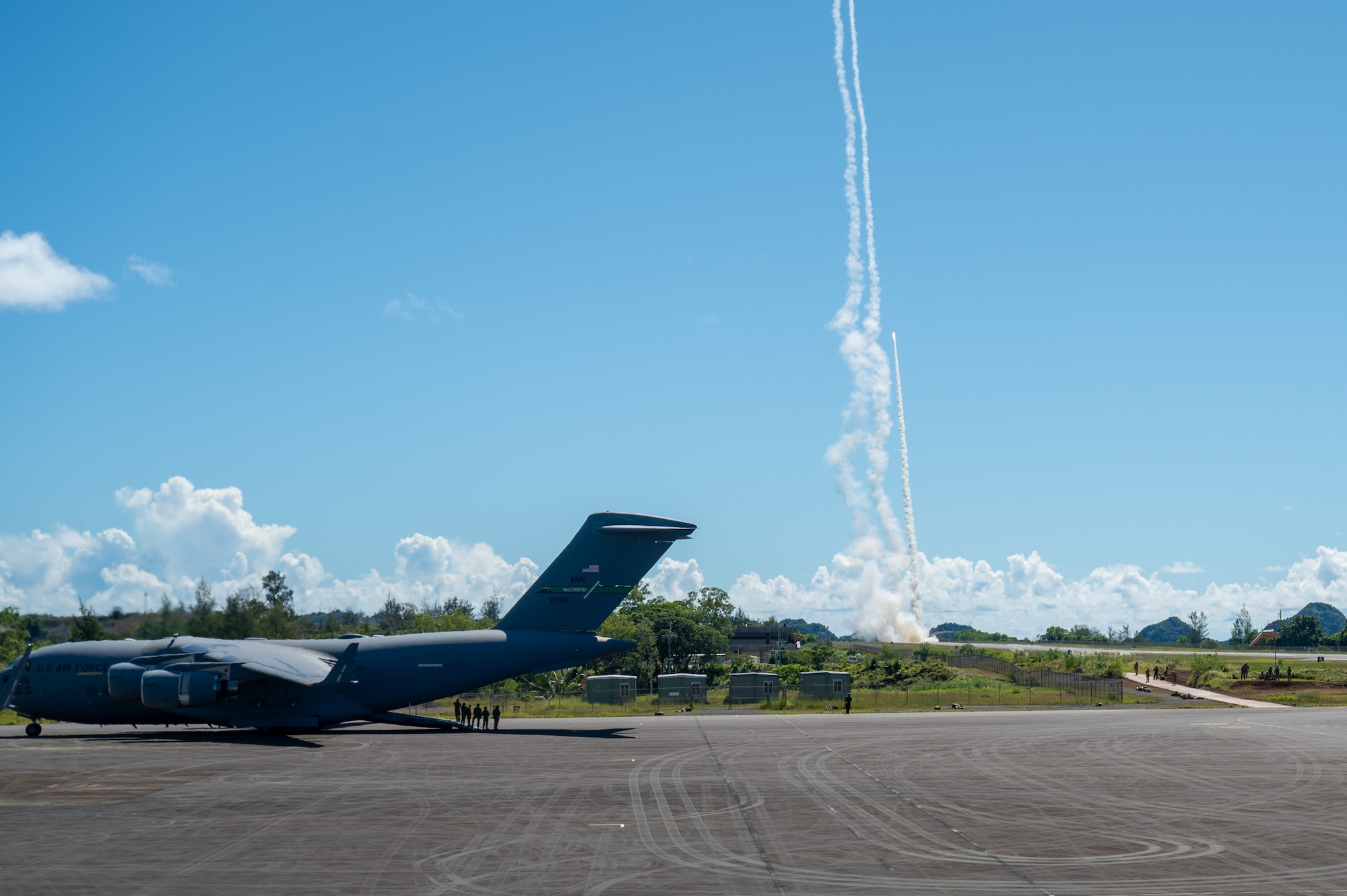A missile is launched in a field.