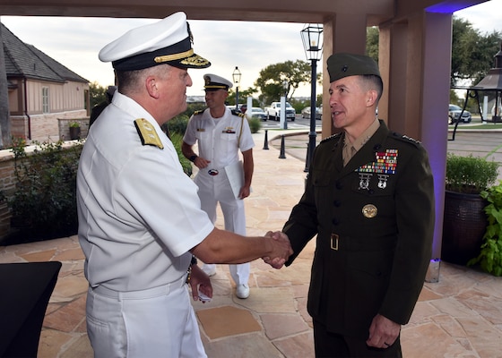 SAN ANTONIO – (Oct. 17, 2024) – Rear Adm. Walter Brafford, commander, Naval Medical Forces Development Command (NMFDC) and chief of the U.S. Navy Dental Corps greets U.S. Marine Corps Lt. Gen. Benjamin Watson, commanding general, Training and Education Command (TECOM) at the 2024 Heroes of Military Medicine San Antonio Awards Program held at The Red Berry Estate. Brafford and Watson served as special guest speakers at the event. The awards program, hosted by the Henry M. Jackson Foundation for the Advancement of Military Medicine, Inc. (HJF), recognized exception community leaders who advance military medicine in and around the greater San Antonio area. The event brought the story of Military City USA’s unique military and civilian medical research and clinical care collaborations to national and global attention. (U.S. Navy photo by Burrell Parmer, NAMRU San Antonio Public Affairs/Released)