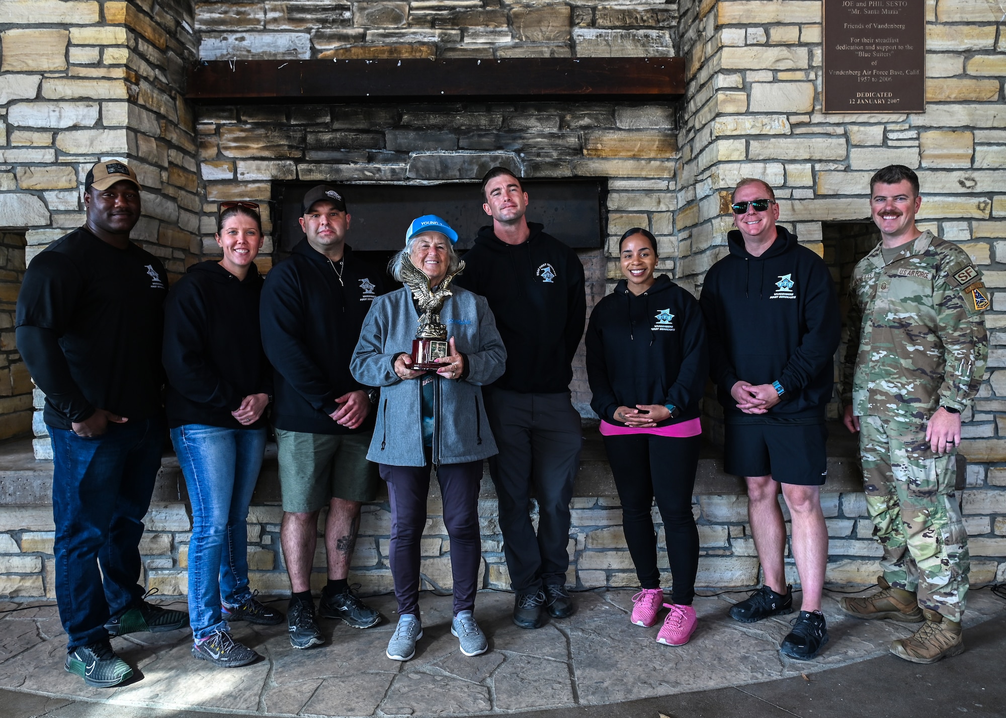 Members of the First Sergeants Council present an award to Sylvia King, Lompoc Valley Chamber of Commerce military affairs chairperson, during an annual Military Appreciation BBQ celebration at Vandenberg Space Force Base.