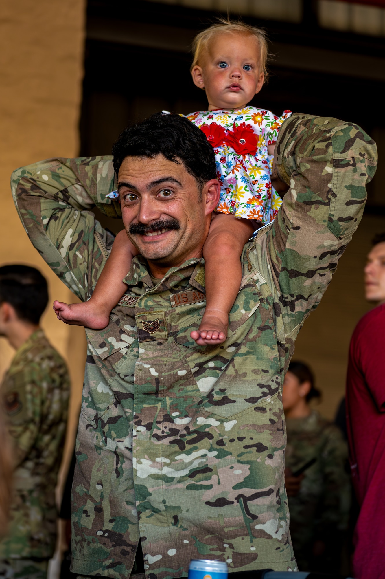 U.S. Air Force Staff Sgt. Jancarlo Torresmartinez, 1st Special Operations Support Squadron independent duty medical technician, waits to welcome his friend returning from deployment at Hurlburt Field, Florida, Oct. 7, 2024.