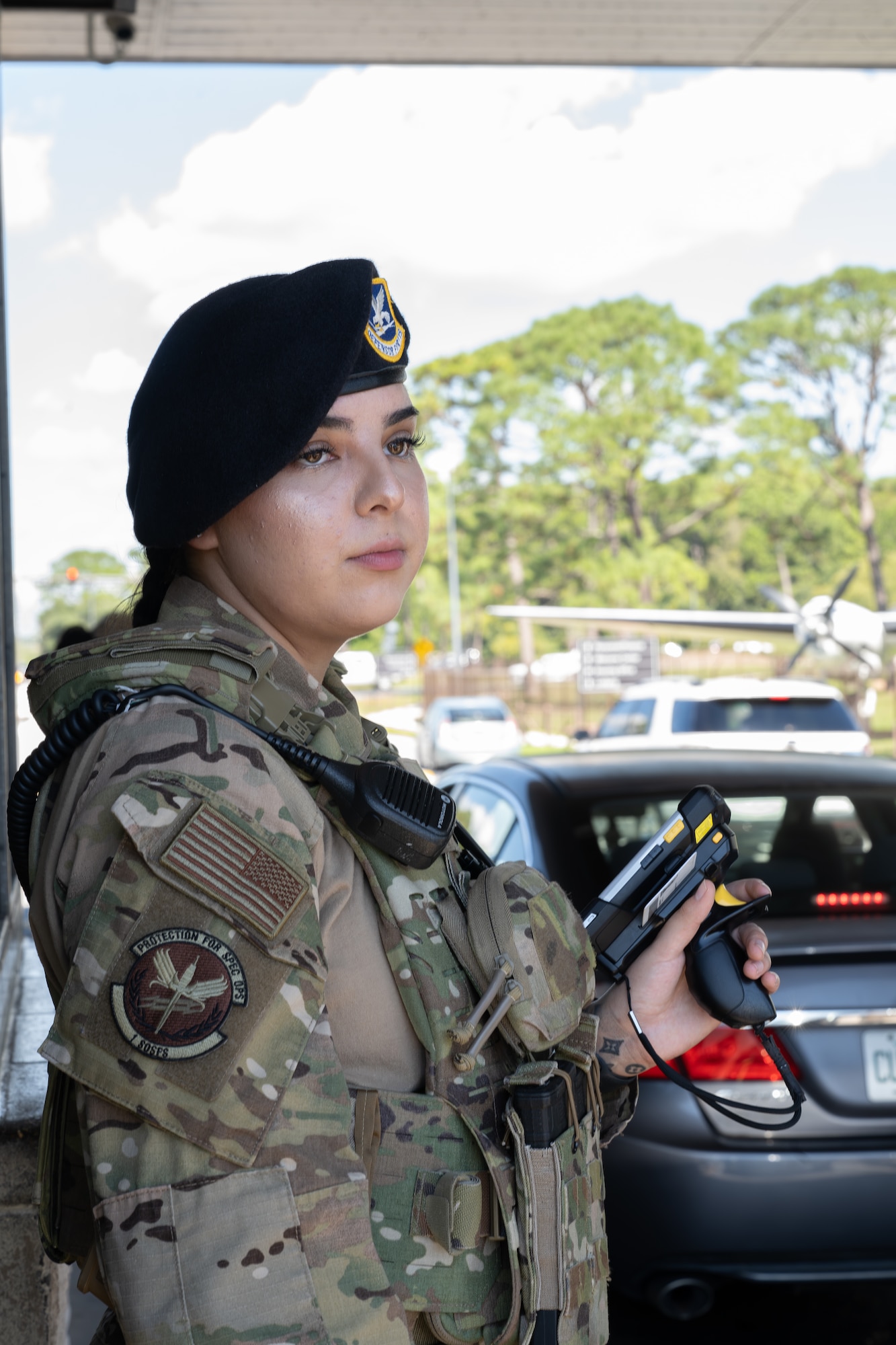 U.S. Air Force Airman 1st Class Lilia Perez, 1st Special Operations Security Forces Squadron patrolman, scans incoming traffic at Hurlburt Field, Florida, Sept. 30, 2024.