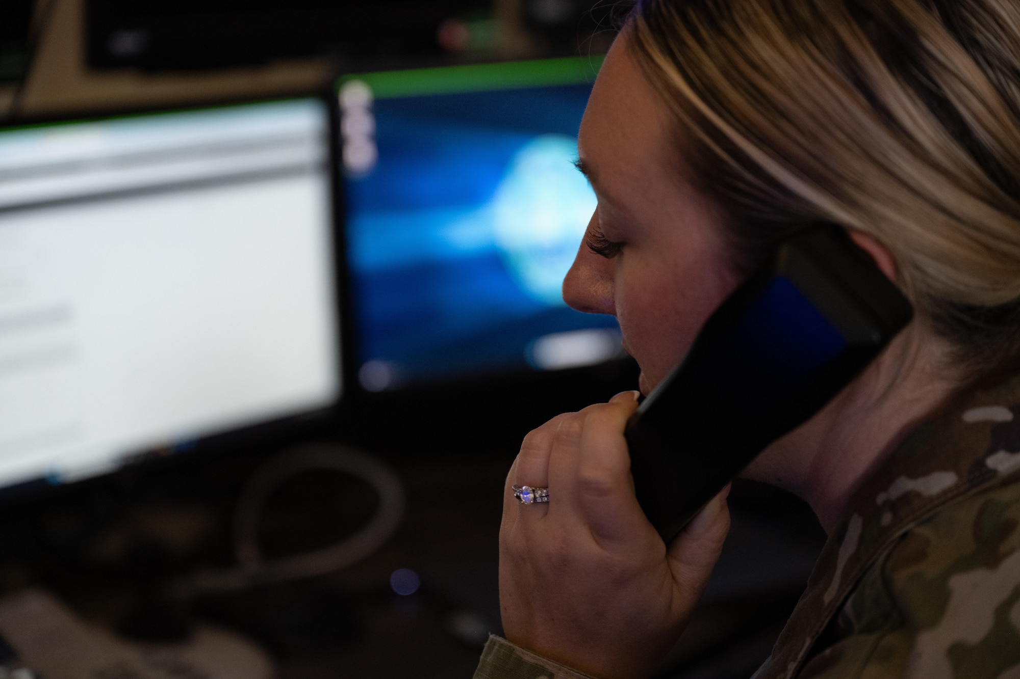 U.S. Air Force Senior Airman Cierra Felix,  1st Special Operations Security Forces Squadron Base Defense Operations Center controller, takes a Base Defense Operations Center call at Hurlburt Field, Florida, Sept. 31, 2024.