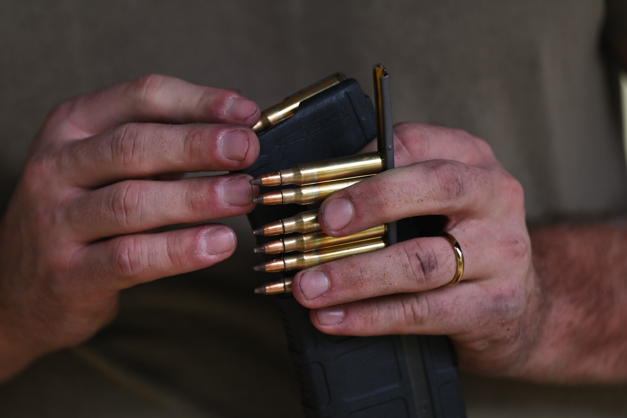 A U.S Airman refills a magazine at the Combat Arms Training and Maintenance Range, Hurlburt Field, Florida, Sept. 25, 2024.