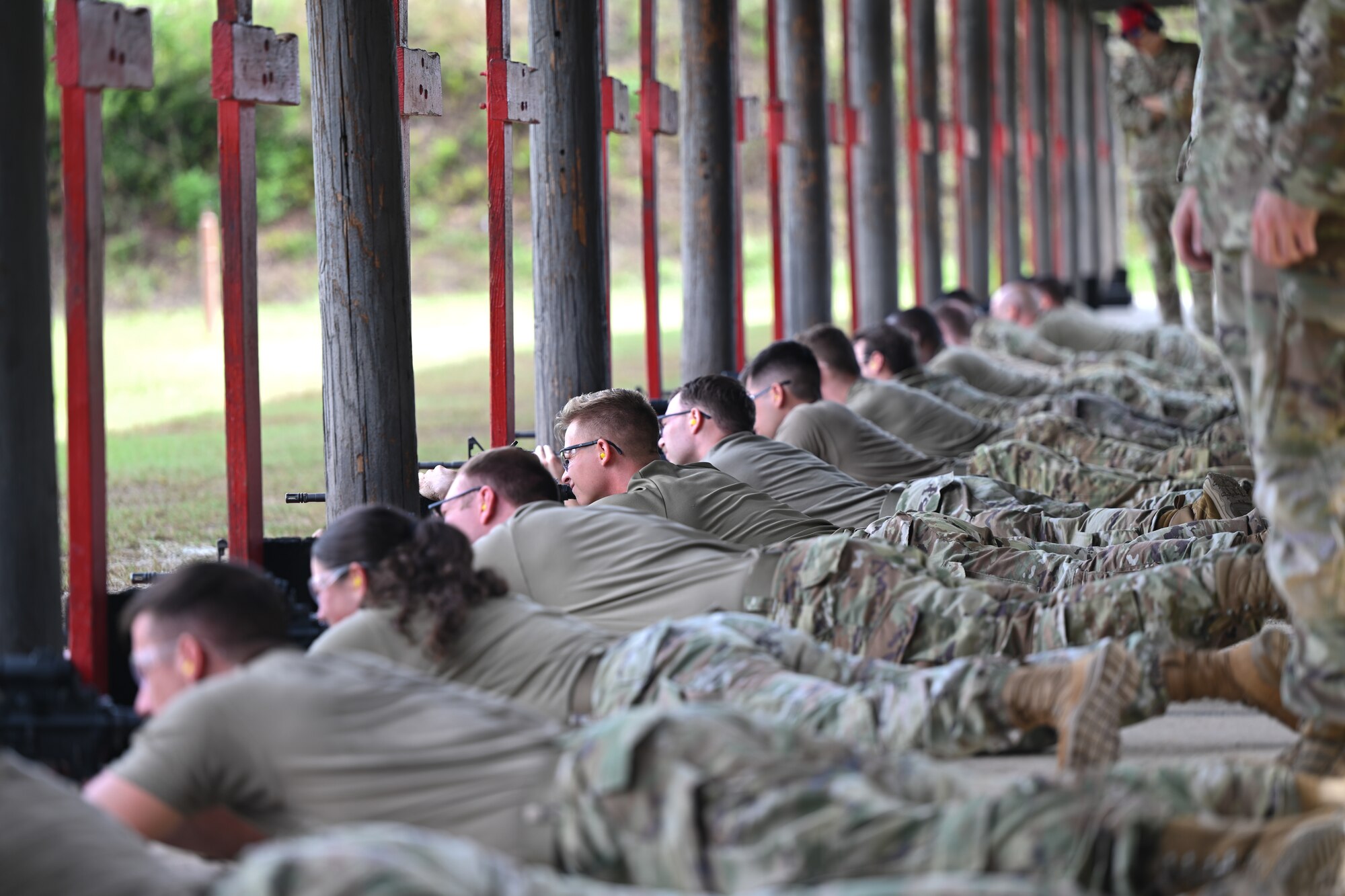 U.S. Airmen fire M4 rifles during the qualifying round at the Combat Arms Training and Maintenance Range, Hurlburt Field, Florida, Sept. 25, 2024.