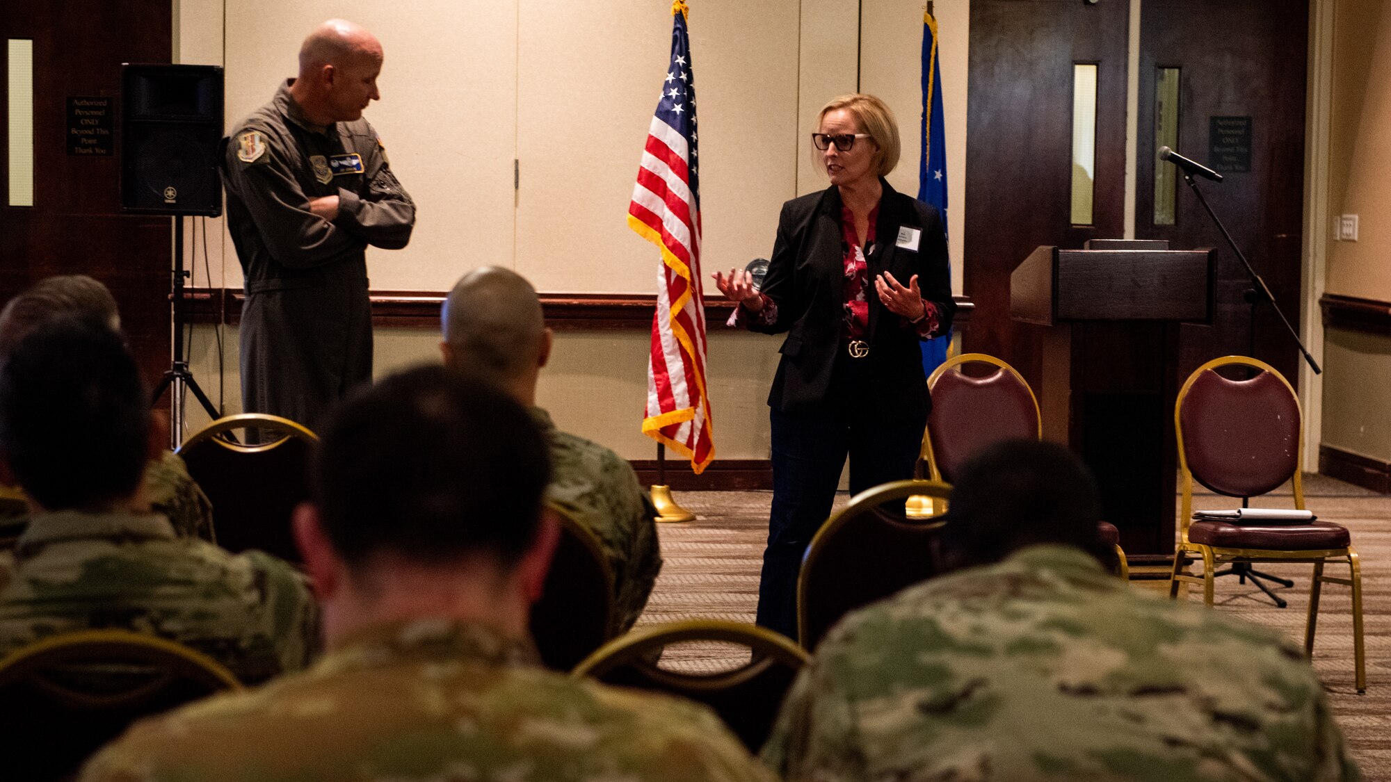 Spouse of 60 AMW commander briefs attendees at course
