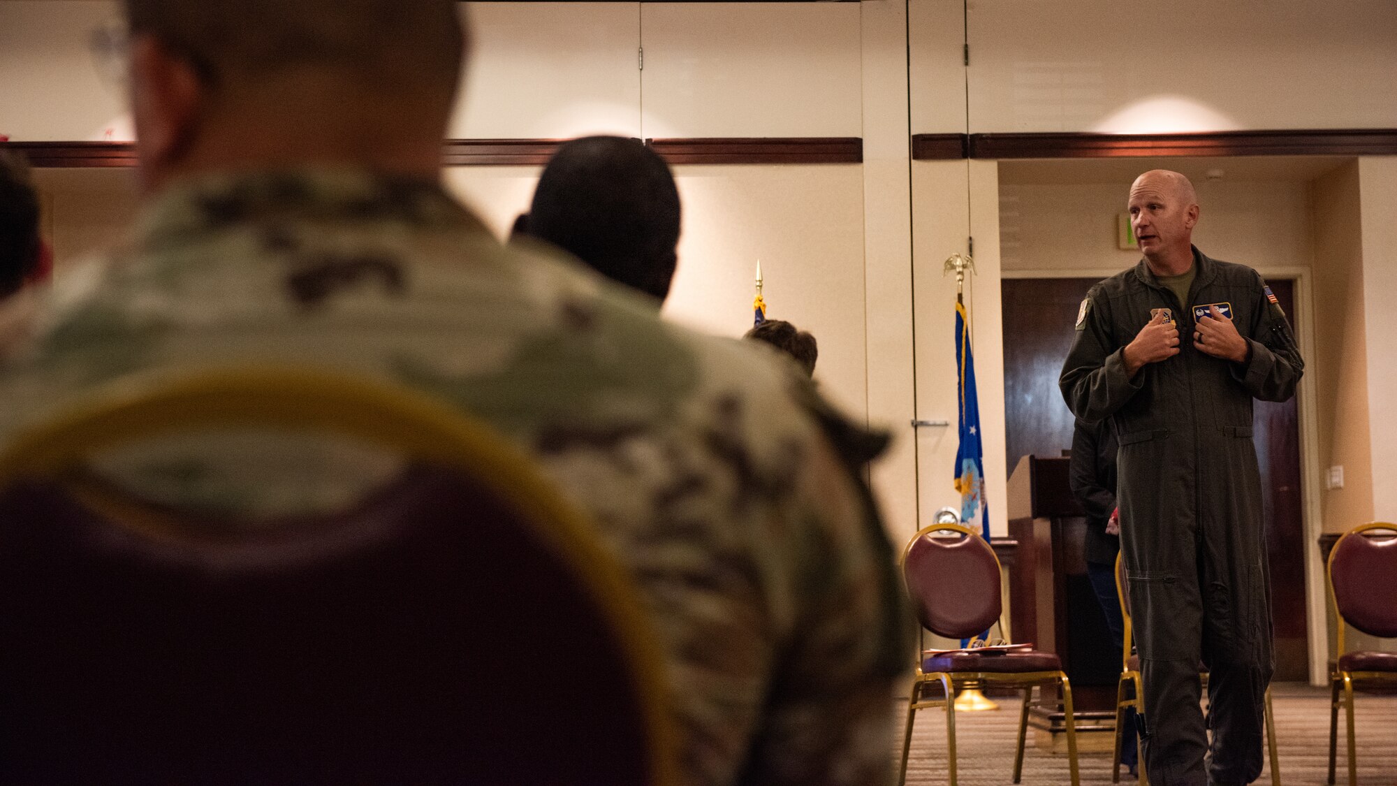 Commander speaks during course
