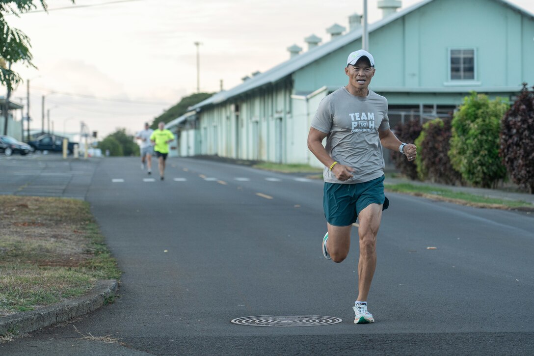 Pat Phung, Construction Branch Chief for the U.S. Army Corps of Engineers, Honolulu District, competes in the 30th Annual Fun Run/Walk and Safety Day 2.5 Fun Run/walk October 18, 2024. Safety day plays a key role in promoting safety and health awareness to help reduce accidents and stay healthy.