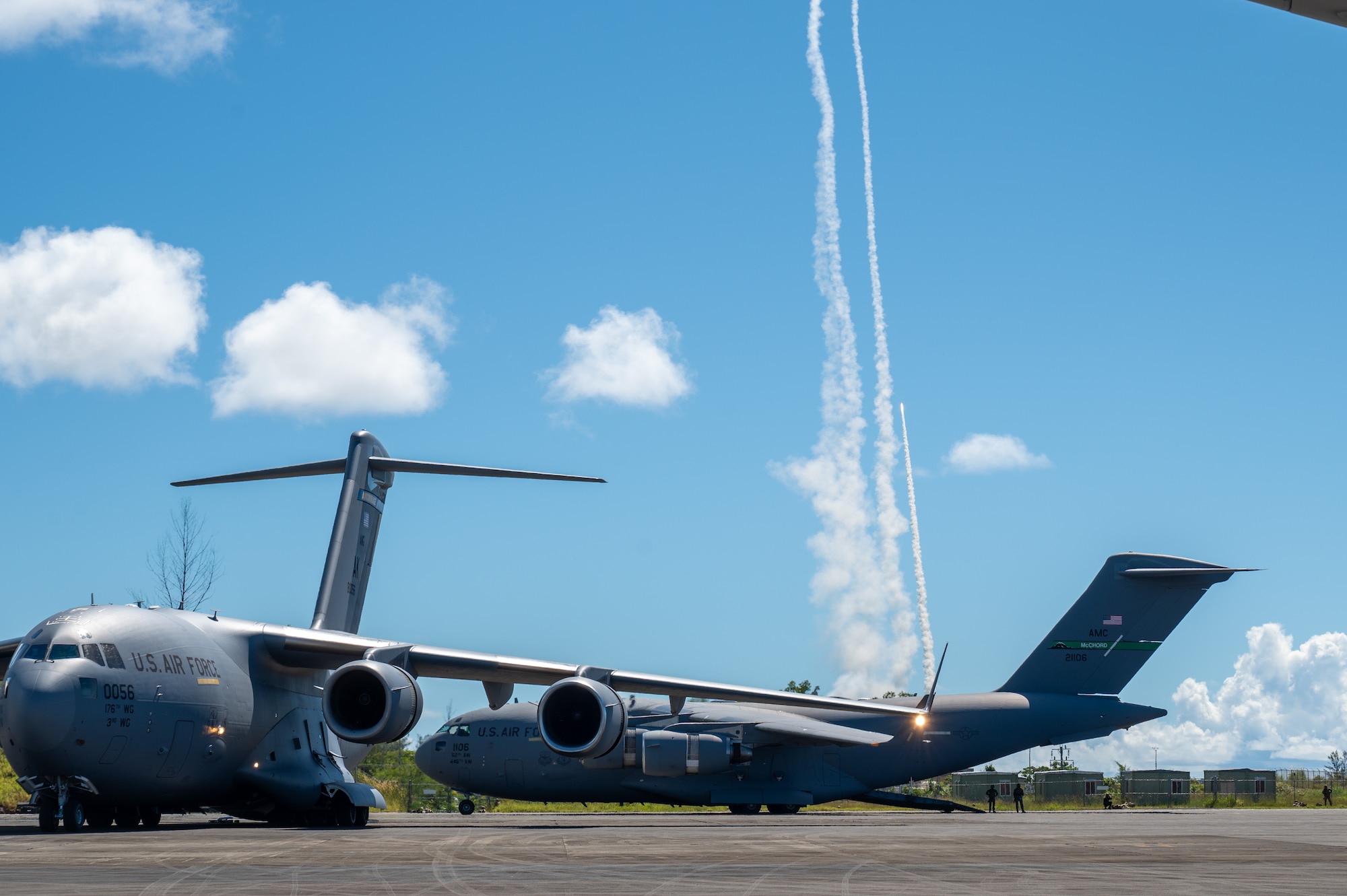 U.S Air Force C-17 Globemaster IIIs participate in a High-Intensity Rapid Air Insertion exercise during Joint Pacific Multinational Readiness Center 25-01 on Palau, Oct. 11, 2024. The Joint Pacific Multinational Readiness Center (JPMRC) is the Army’s newest Combat Training Center (CTC) and generates readiness in the environments and conditions where our forces are most likely to operate in. JPMRC 25-01 includes training participants from across the U.S. Joint Force, and multinational Allies and partners. (U.S Air Force photo by Senior Airman Mark Sulaica)