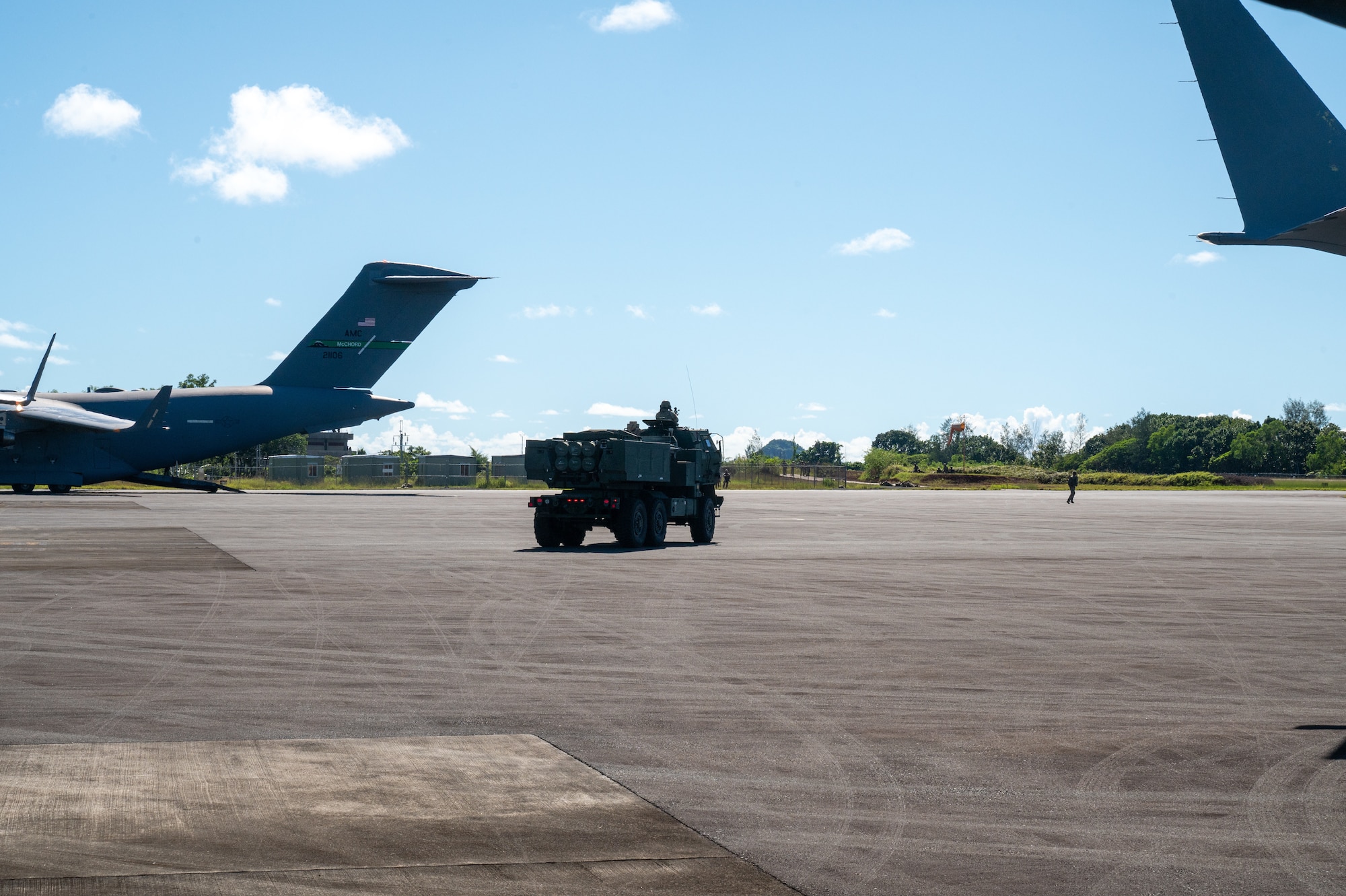 U.S Army soldiers assigned to the 17th Field Artillery Brigade drive a High Mobility Artillery Rocket System (HIMAR) to conduct a High-Intensity Rapid Air Insertion training during Joint Pacific Multinational Readiness Center on Palau, Oct. 11, 2024. The Joint Pacific Multinational Readiness Center (JPMRC) is the Army’s newest Combat Training Center (CTC) and generates readiness in the environments and conditions where our forces are most likely to operate in. JPMRC 25-01 includes training participants from across the U.S. Joint Force, and multinational Allies and partners. (U.S Air Force photo by Senior Airman Mark Sulaica)