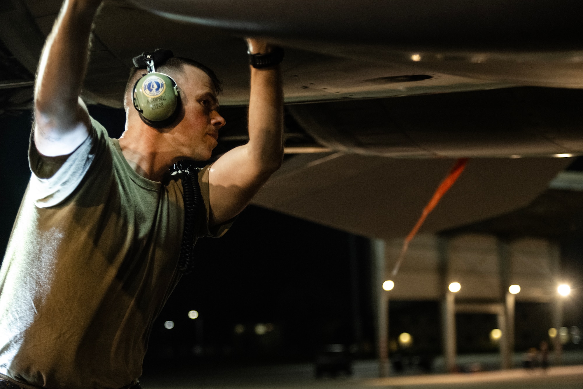 Staff Sgt. James Campbell, 334th Fighter Generation Squadron cannibalization manager, performs maintenance on an F-15E Strike Eagle.